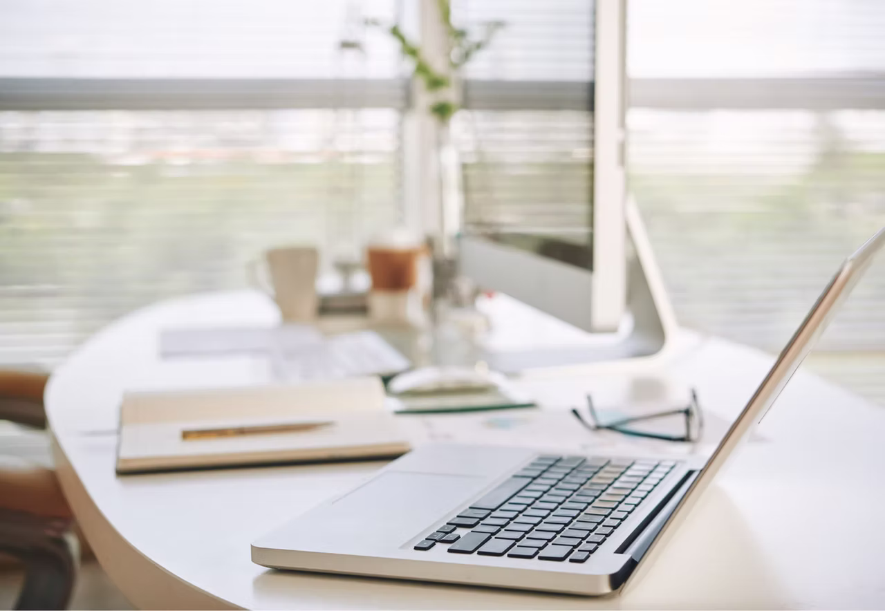 Laptop open on desk processing direct billing for dietitian services