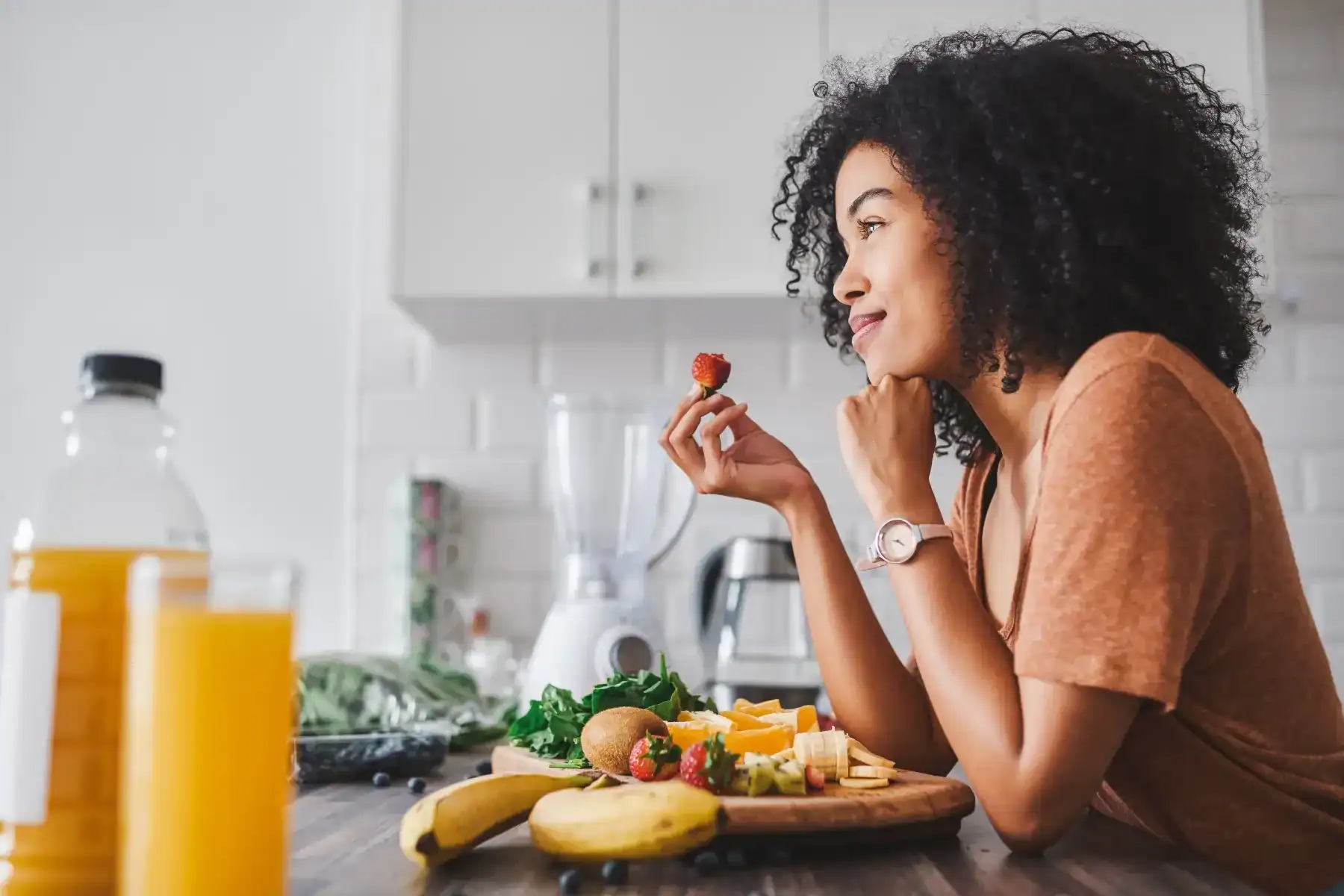 Ingood Nutrition Dietitian Services & Nutrition Counselling, Woman Sitting at a kitchen counter.